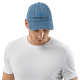 Load image into Gallery viewer, Check out our Denim Hat featuring the iconic Onward Motion logo!
